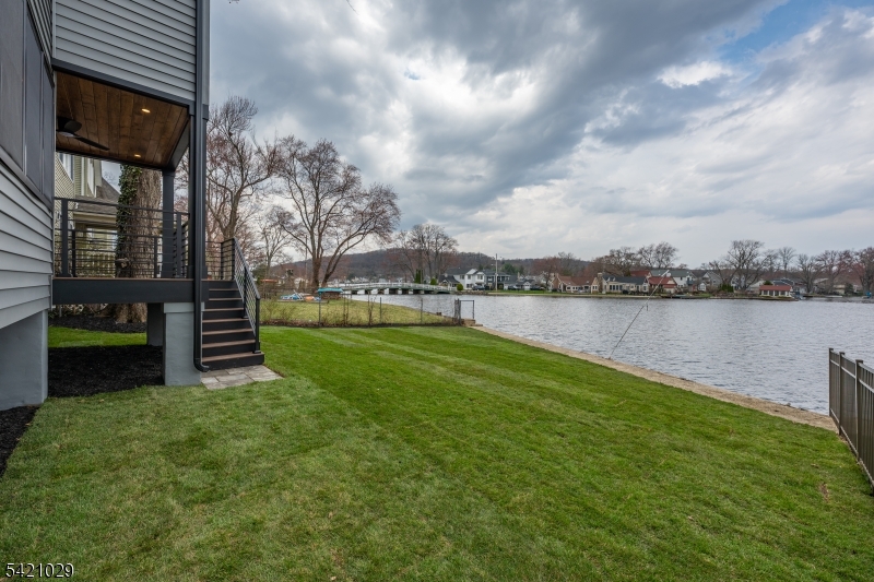 43 East Shore Road Denville, NJ 07834 - Photo 41 of 45 a view of a lake with houses in back