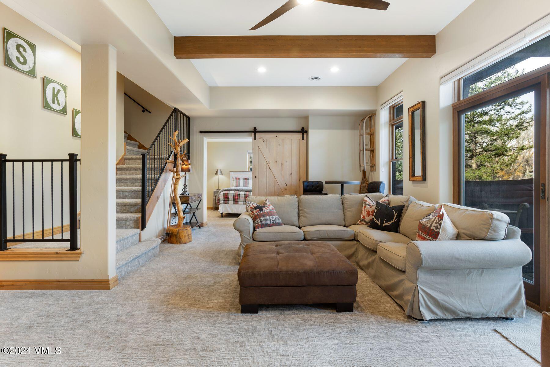39555 Highway 6, Unit E Avon, CO 81620 - Photo 12 of 42 a living room with furniture and a large window