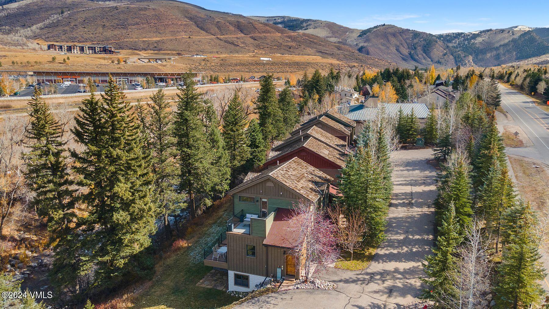 39555 Highway 6, Unit E Avon, CO 81620 - Photo 38 of 42 a view of a house with a mountain