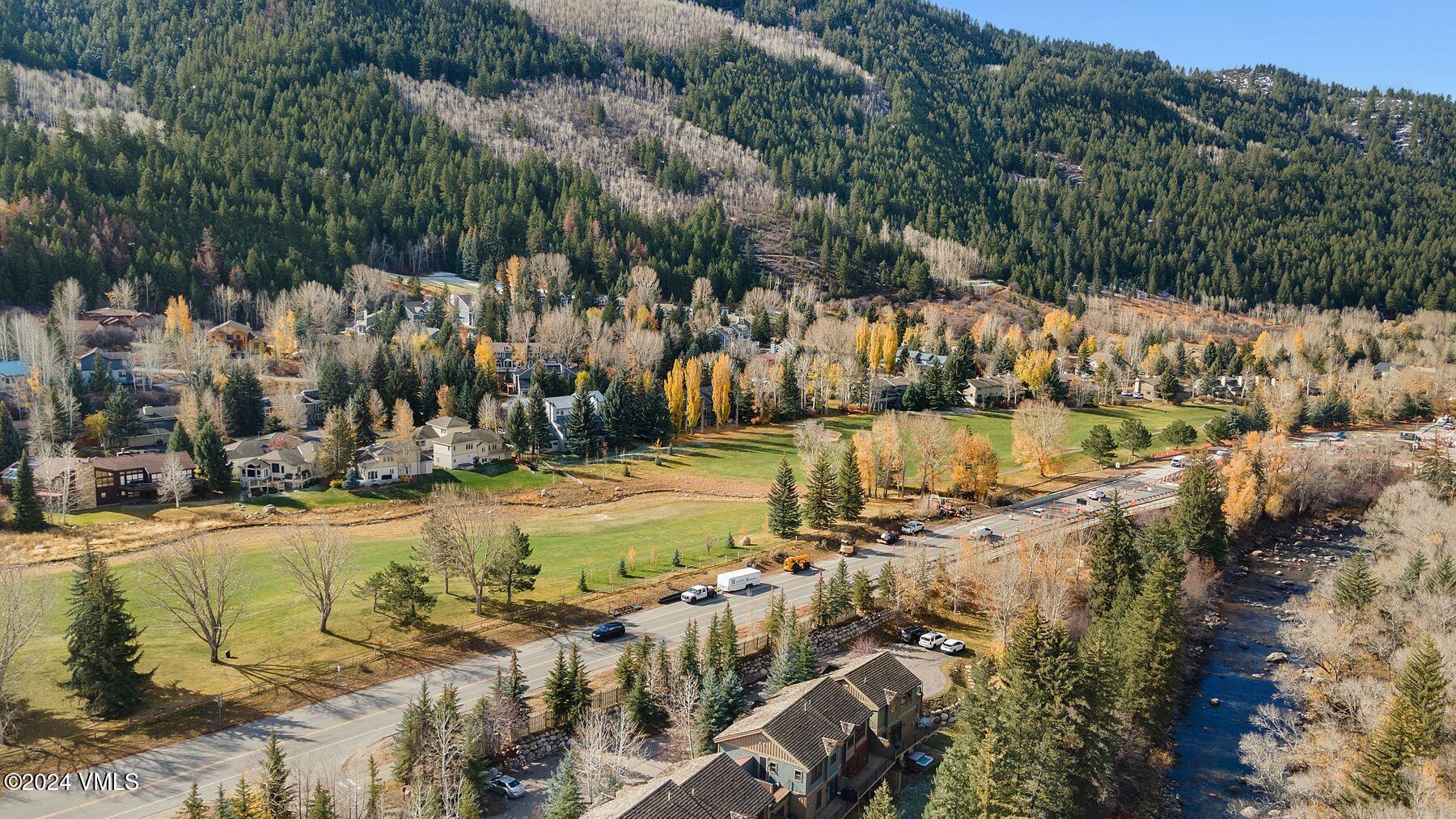 39555 Highway 6, Unit E Avon, CO 81620 - Photo 41 of 42 a view of a yard with mountain
