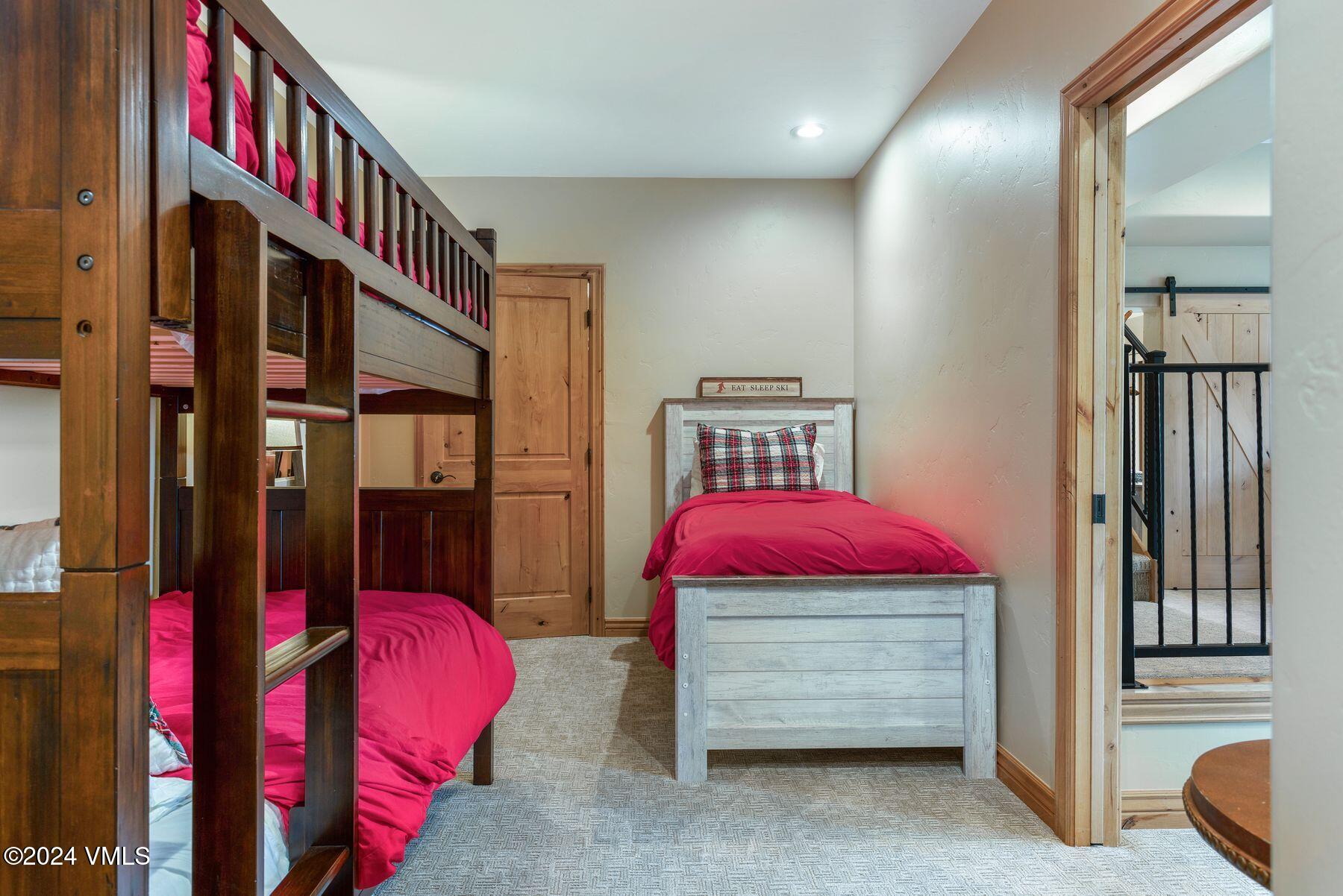 39555 Highway 6, Unit E Avon, CO 81620 - Photo 10 of 42 a bedroom with a bed and a window