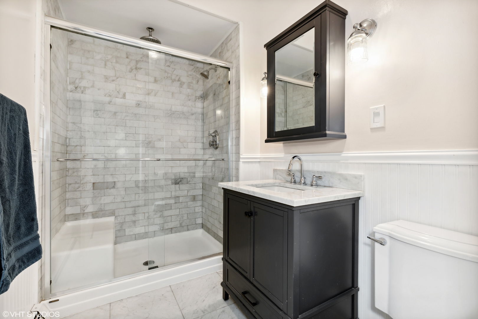 17859 Howe Avenue Homewood, IL 60430 - Photo 11 of 25 a bathroom with a sink toilet a mirror and shower