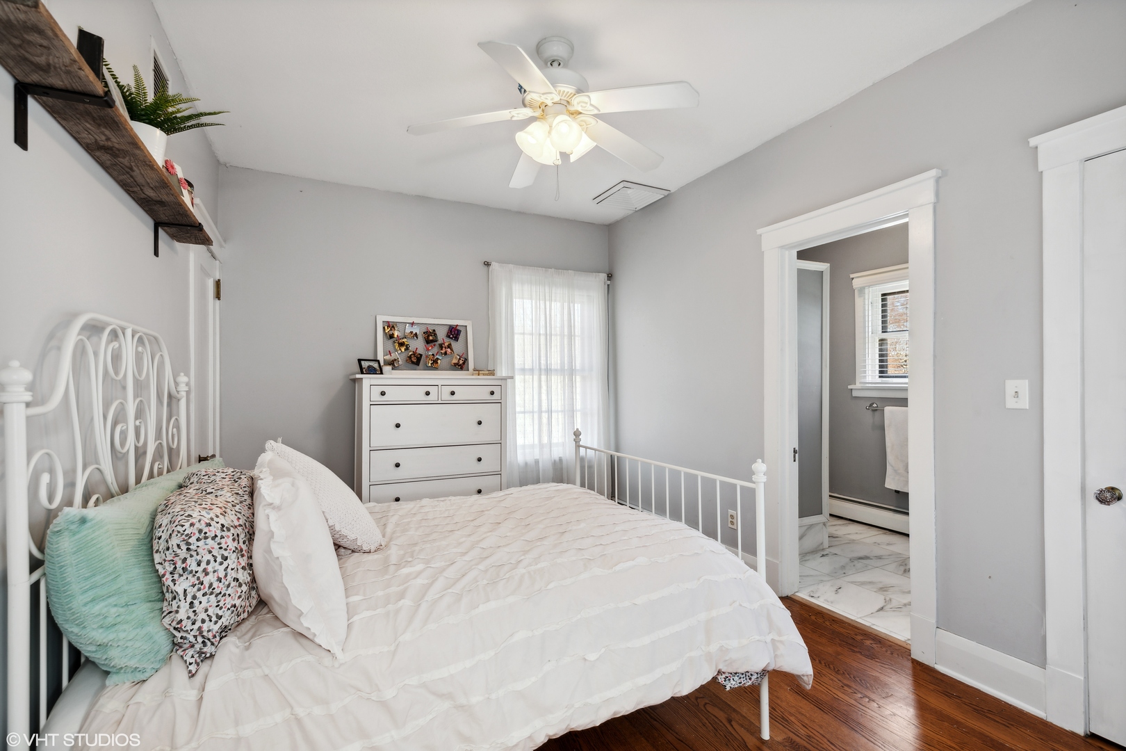 17859 Howe Avenue Homewood, IL 60430 - Photo 15 of 25 a bedroom with a bed and a chandelier