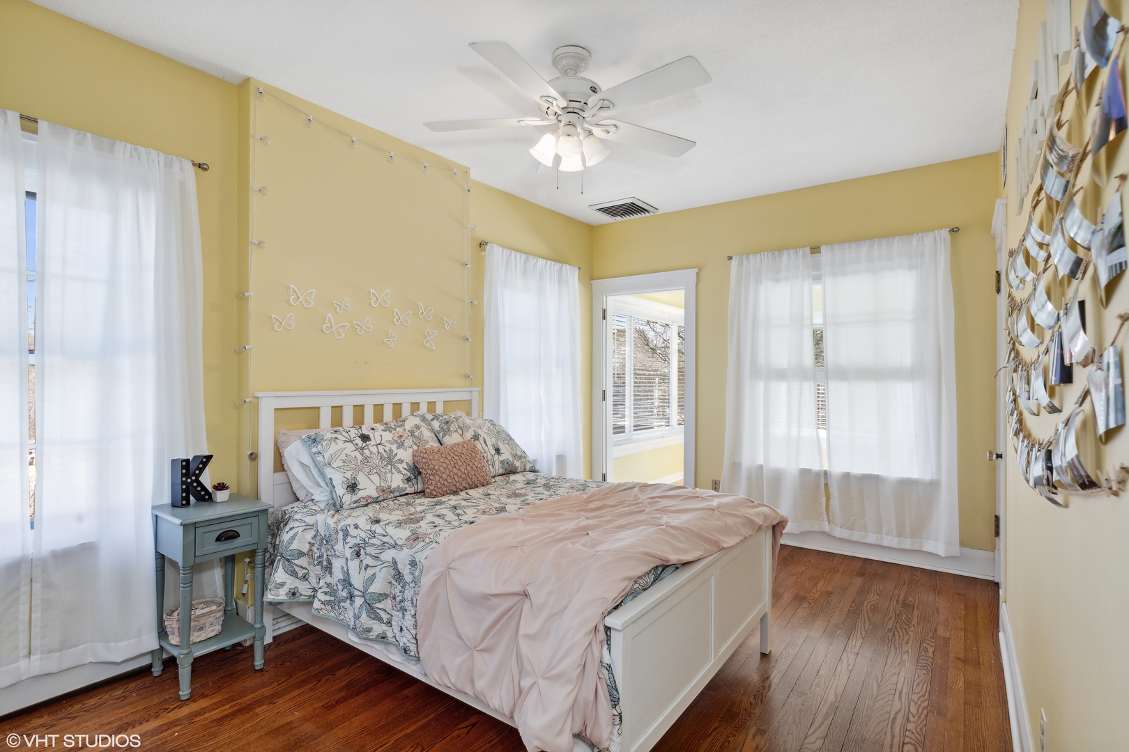 17859 Howe Avenue Homewood, IL 60430 - Photo 17 of 25 a bedroom with a large bed and a chandelier