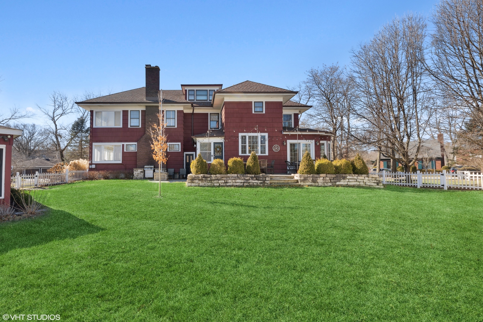 17859 Howe Avenue Homewood, IL 60430 - Photo 21 of 25 a front view of a house with a garden and trees