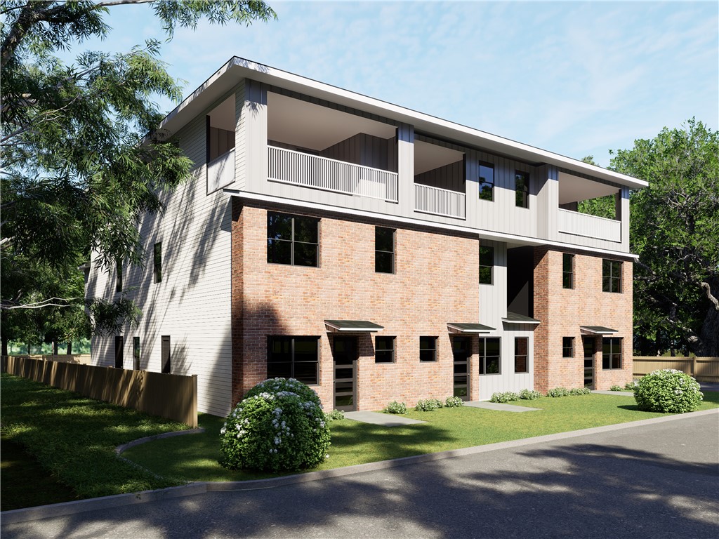 310 Grove Street College Station, TX 77840 - Photo 5 of 6 a front view of a house with a yard