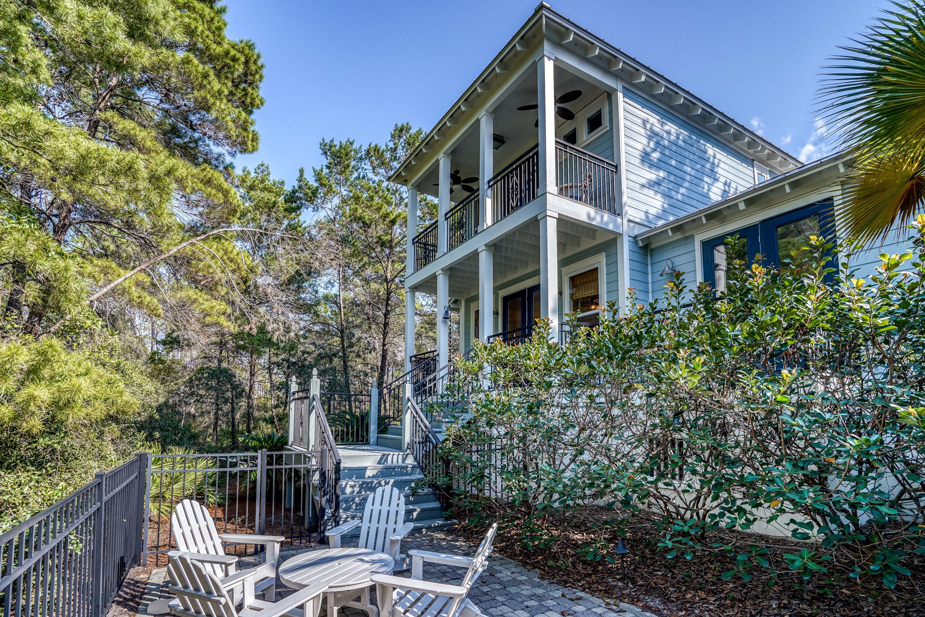 43 Lifeguard Loop East Inlet Beach, FL 32461 - Photo 1 of 44 a front view of a house with trees