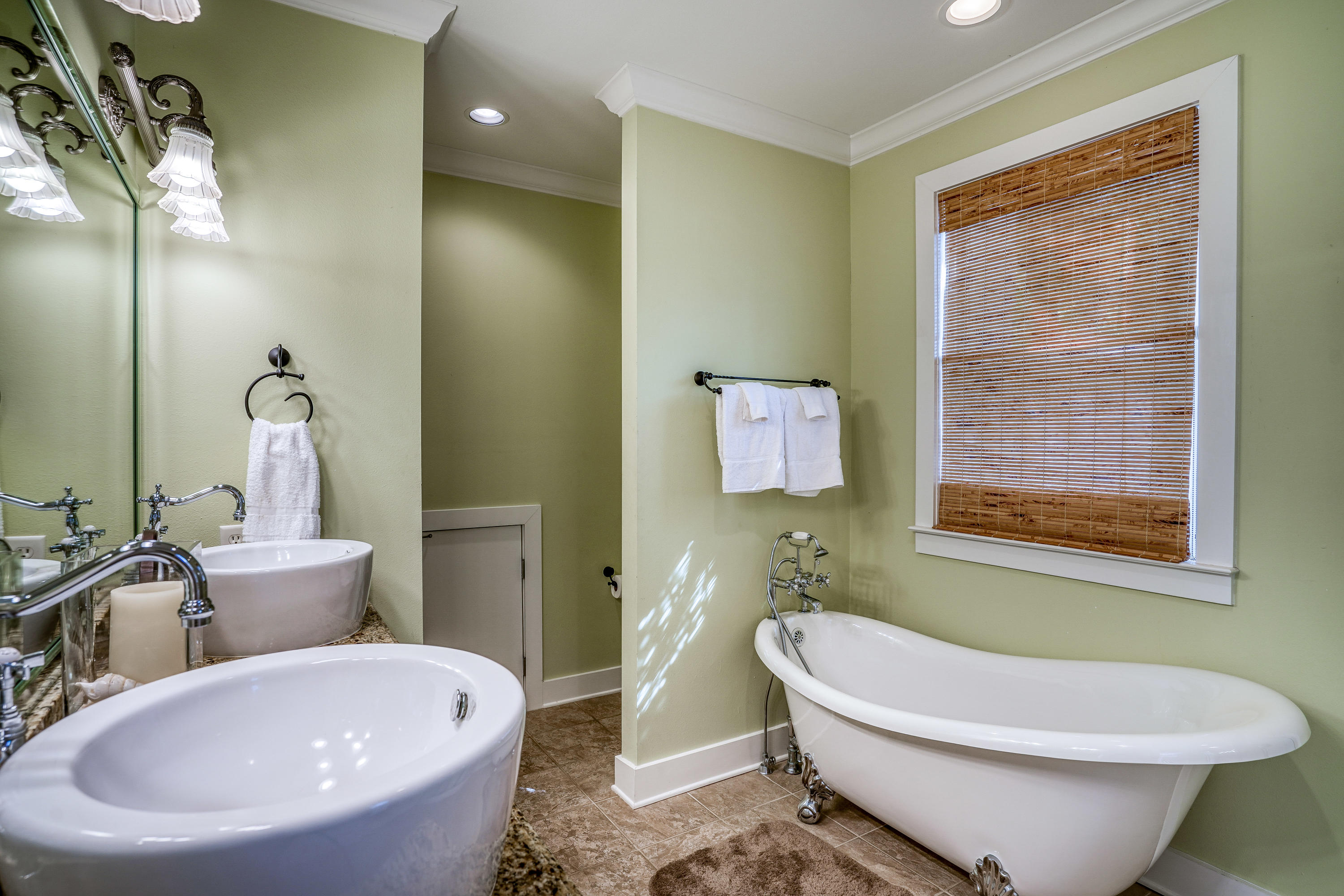 43 Lifeguard Loop East Inlet Beach, FL 32461 - Photo 15 of 44 a bathroom with a white tub a toilet and a sink