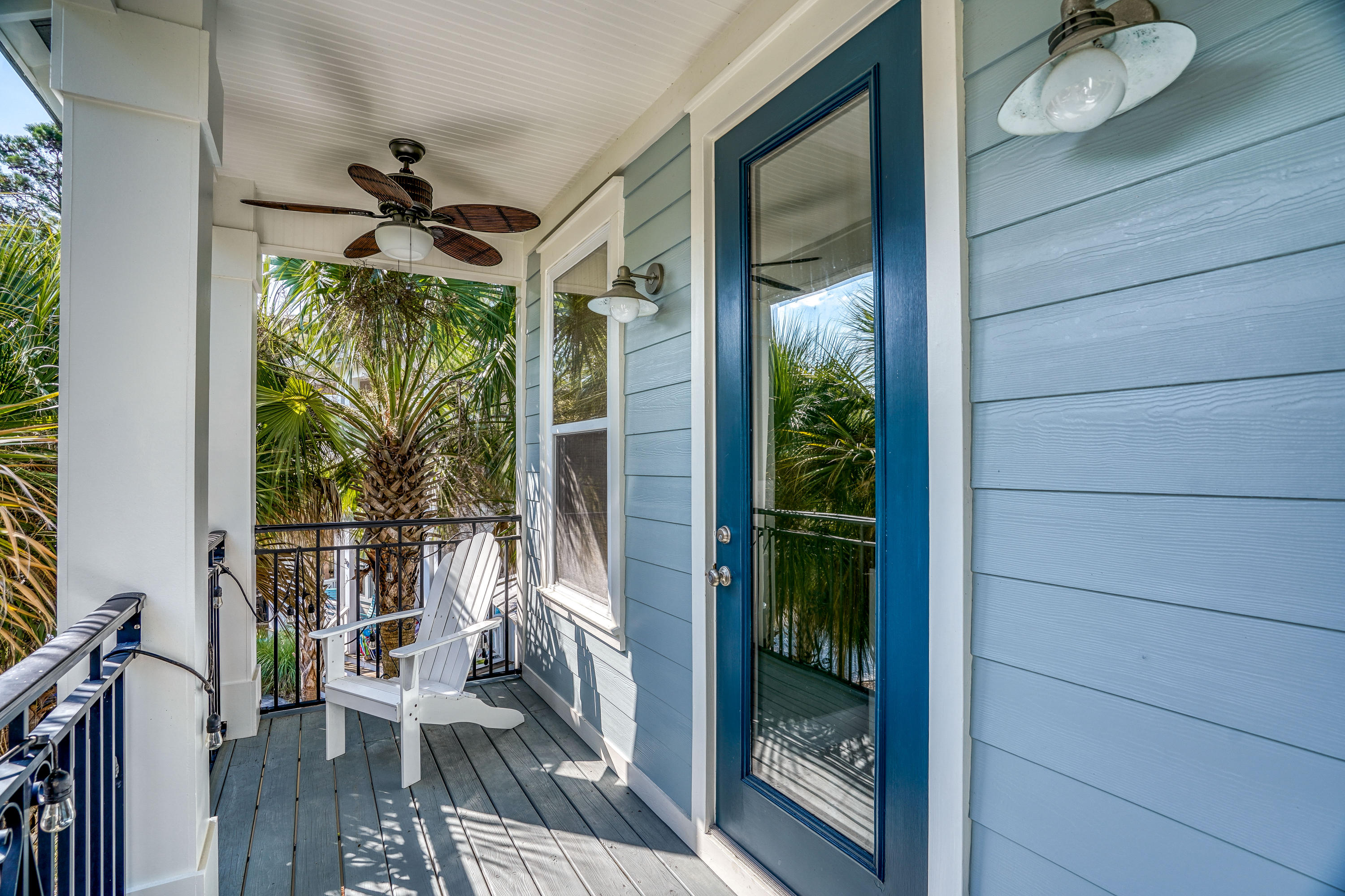 43 Lifeguard Loop East Inlet Beach, FL 32461 - Photo 24 of 44 a view of a balcony with wooden floor and iron stairs