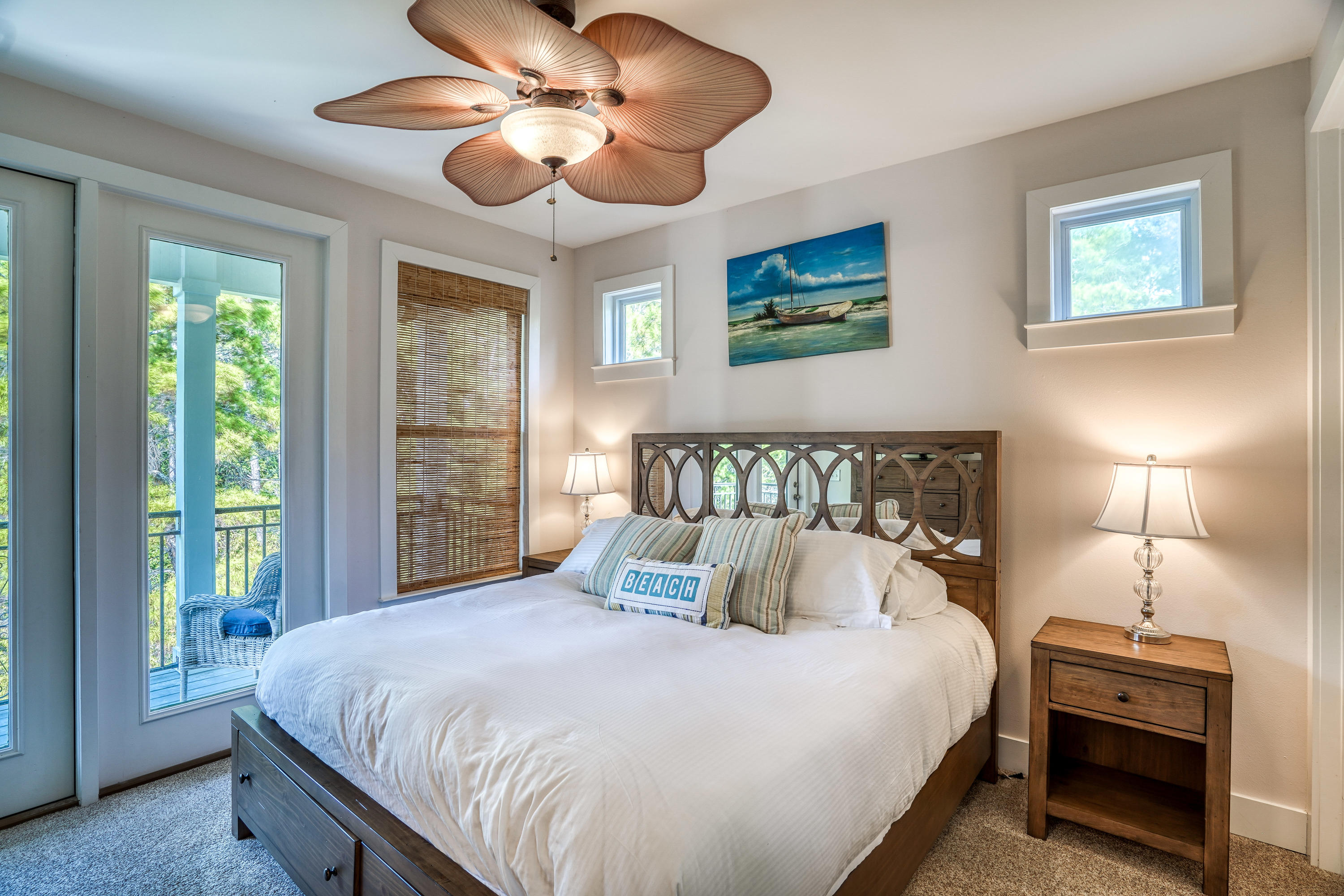 43 Lifeguard Loop East Inlet Beach, FL 32461 - Photo 25 of 44 a bedroom with a bed and a chandelier