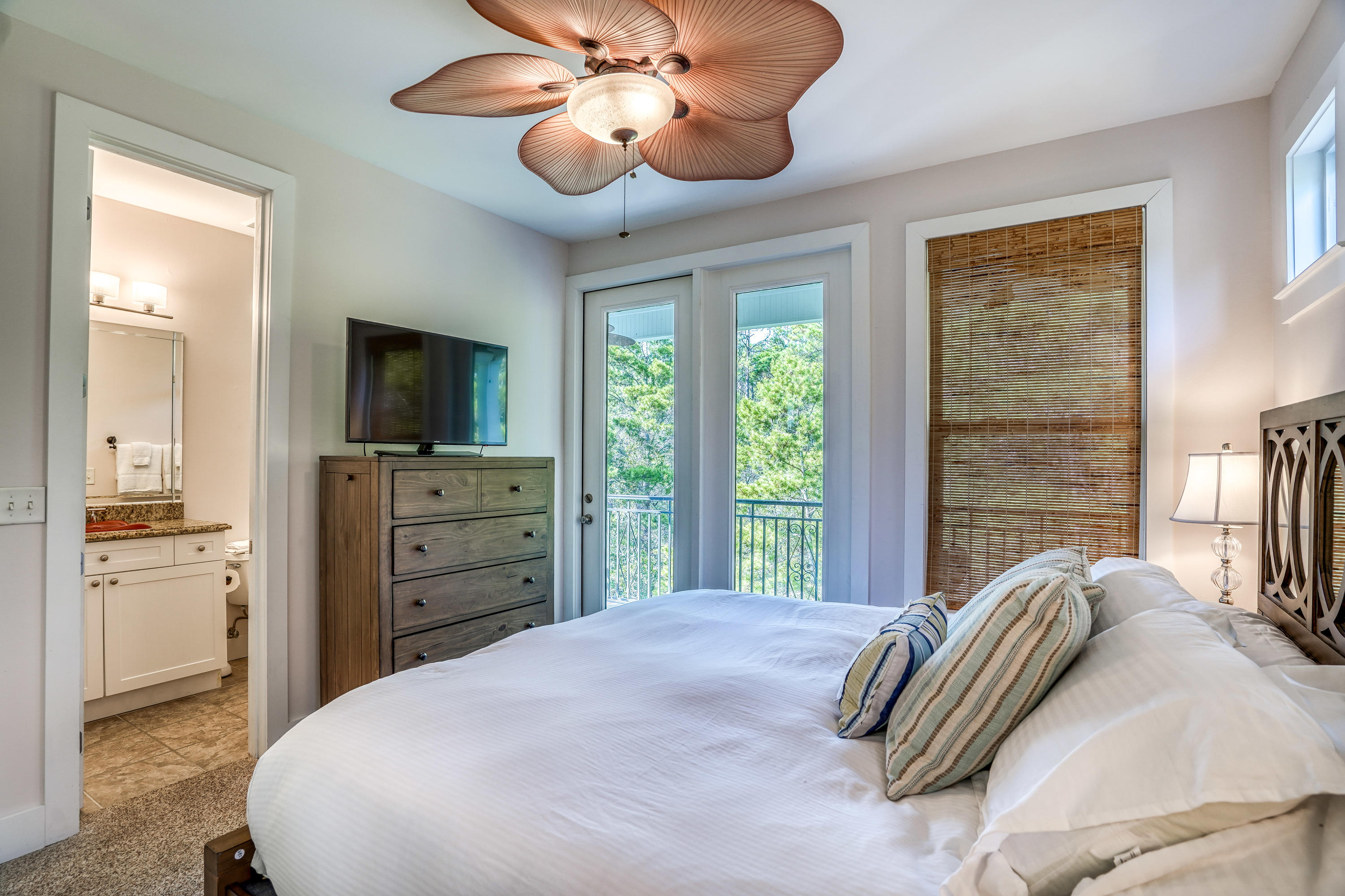 43 Lifeguard Loop East Inlet Beach, FL 32461 - Photo 26 of 44 a bedroom with a bed and wooden floor