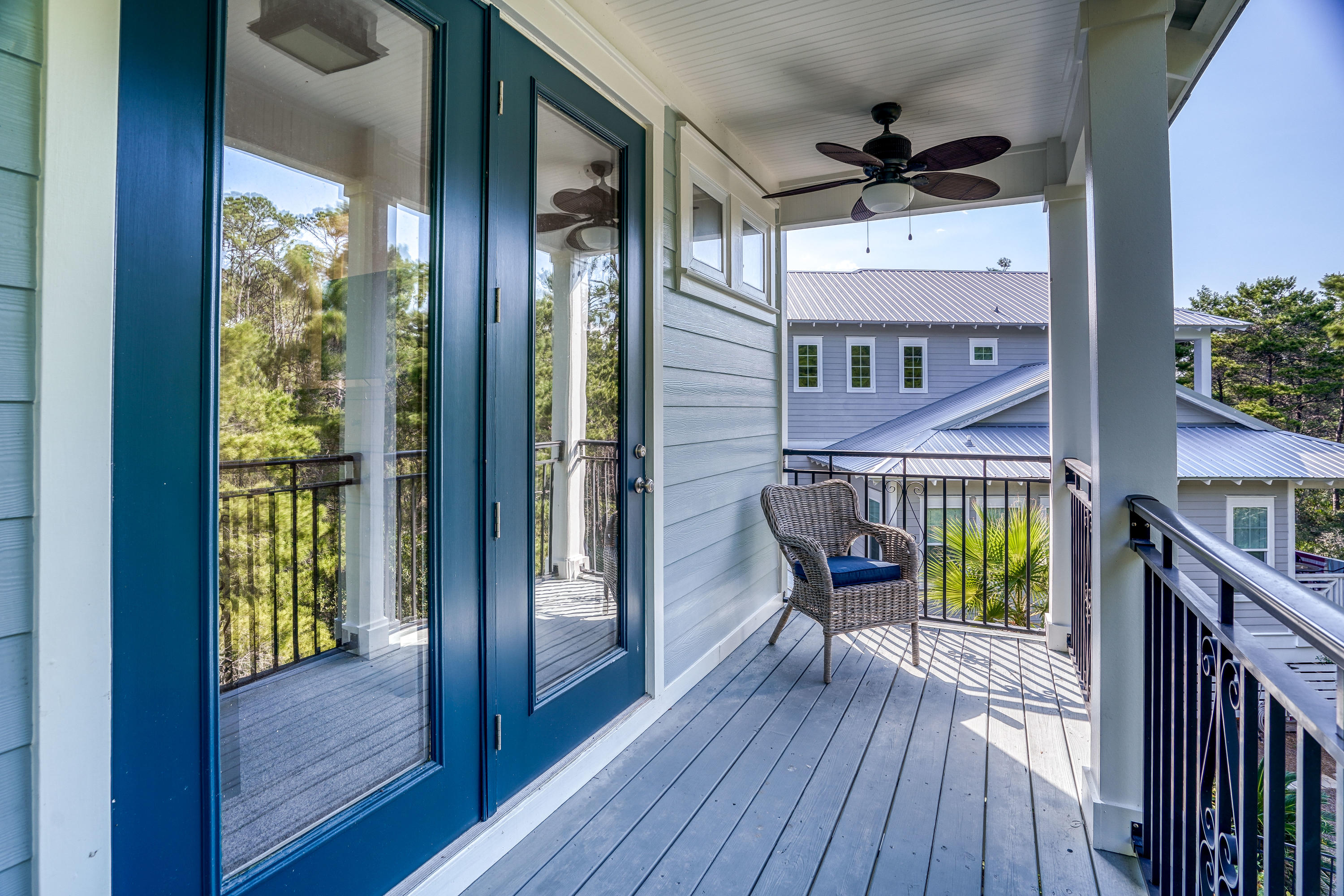 43 Lifeguard Loop East Inlet Beach, FL 32461 - Photo 30 of 44 a view of front door deck and chair with wooden floor
