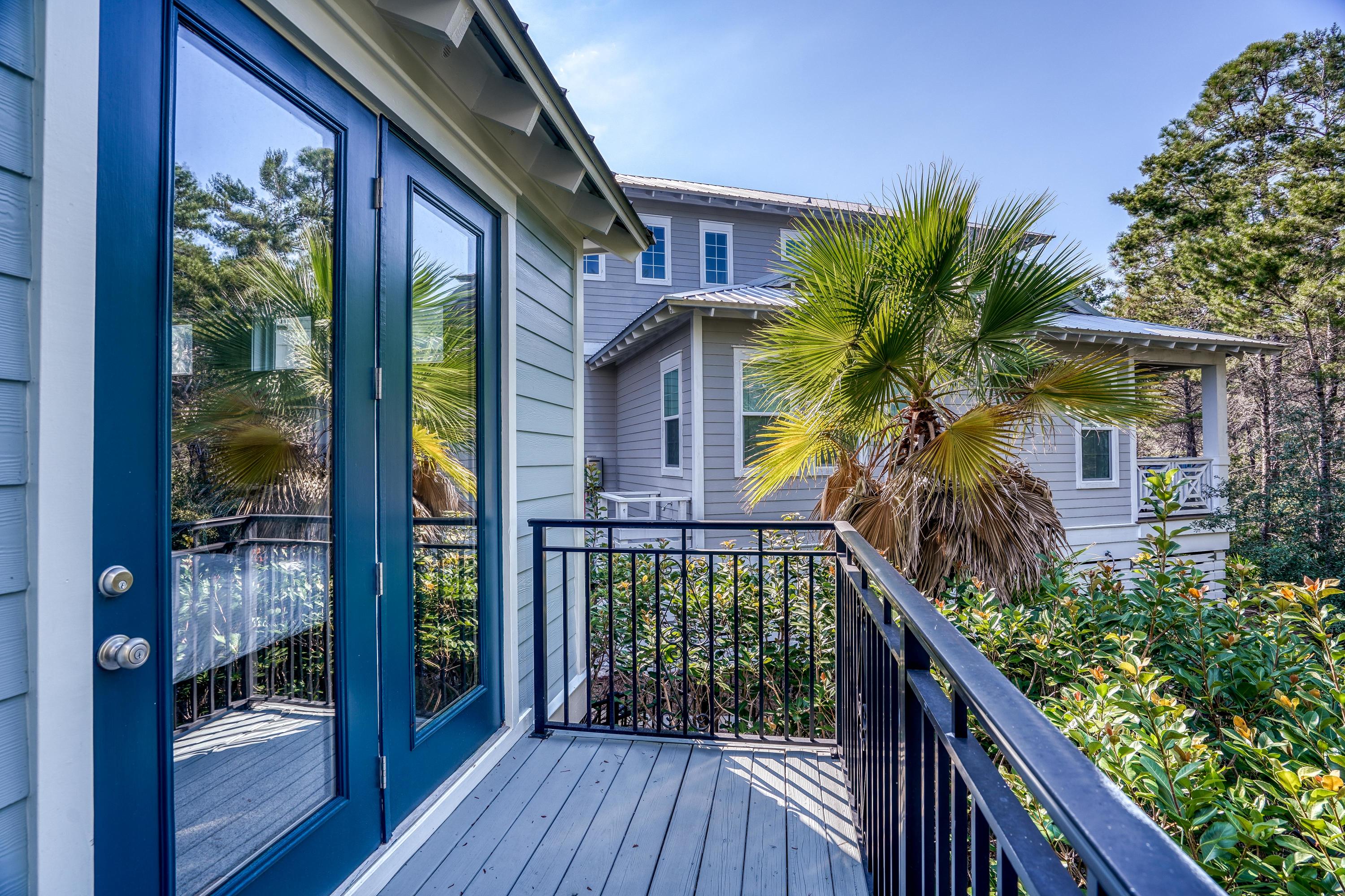 43 Lifeguard Loop East Inlet Beach, FL 32461 - Photo 33 of 44 a house with wooden floor in front of it