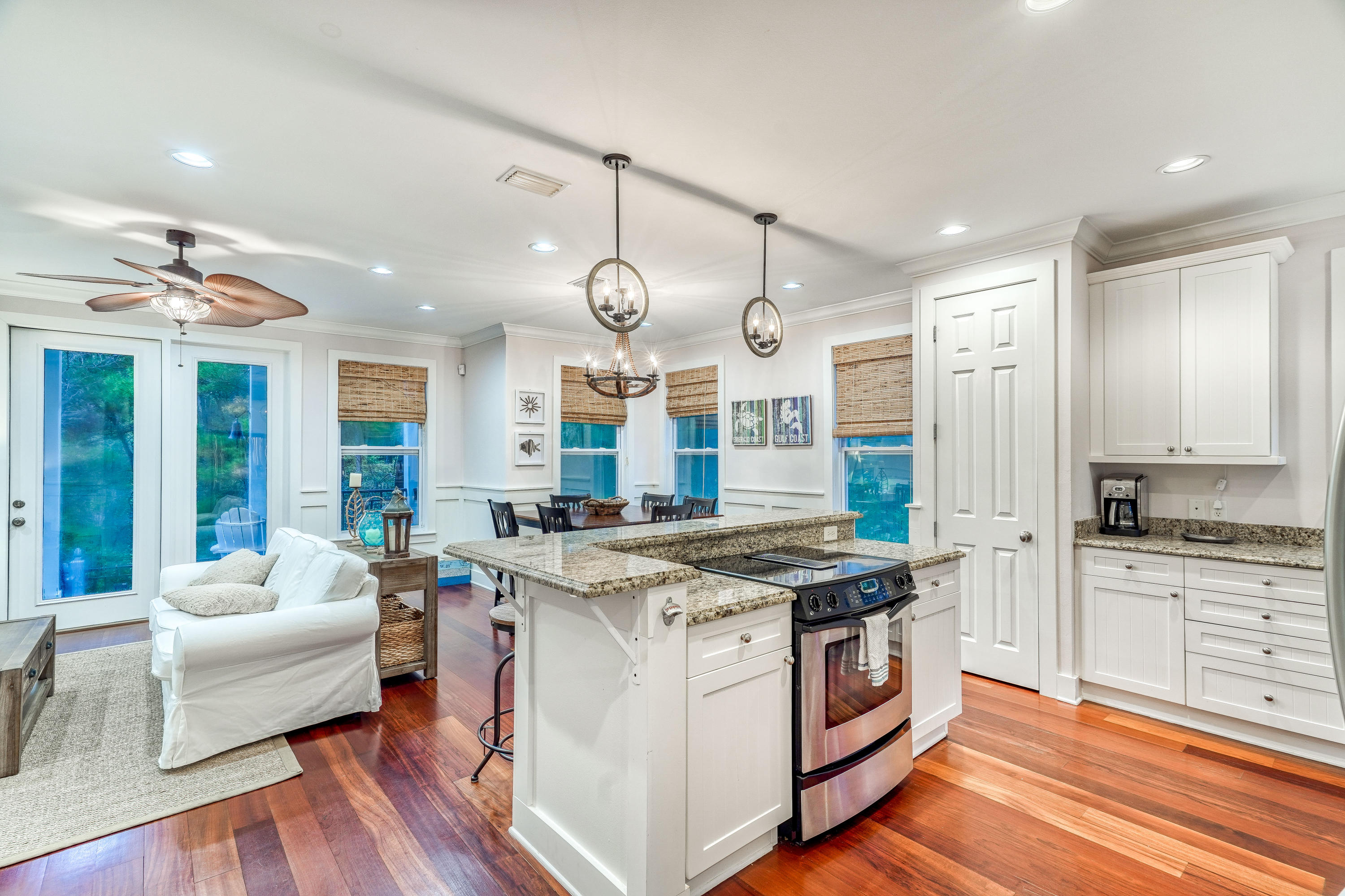 43 Lifeguard Loop East Inlet Beach, FL 32461 - Photo 4 of 44 a kitchen with a stove and a wooden floor