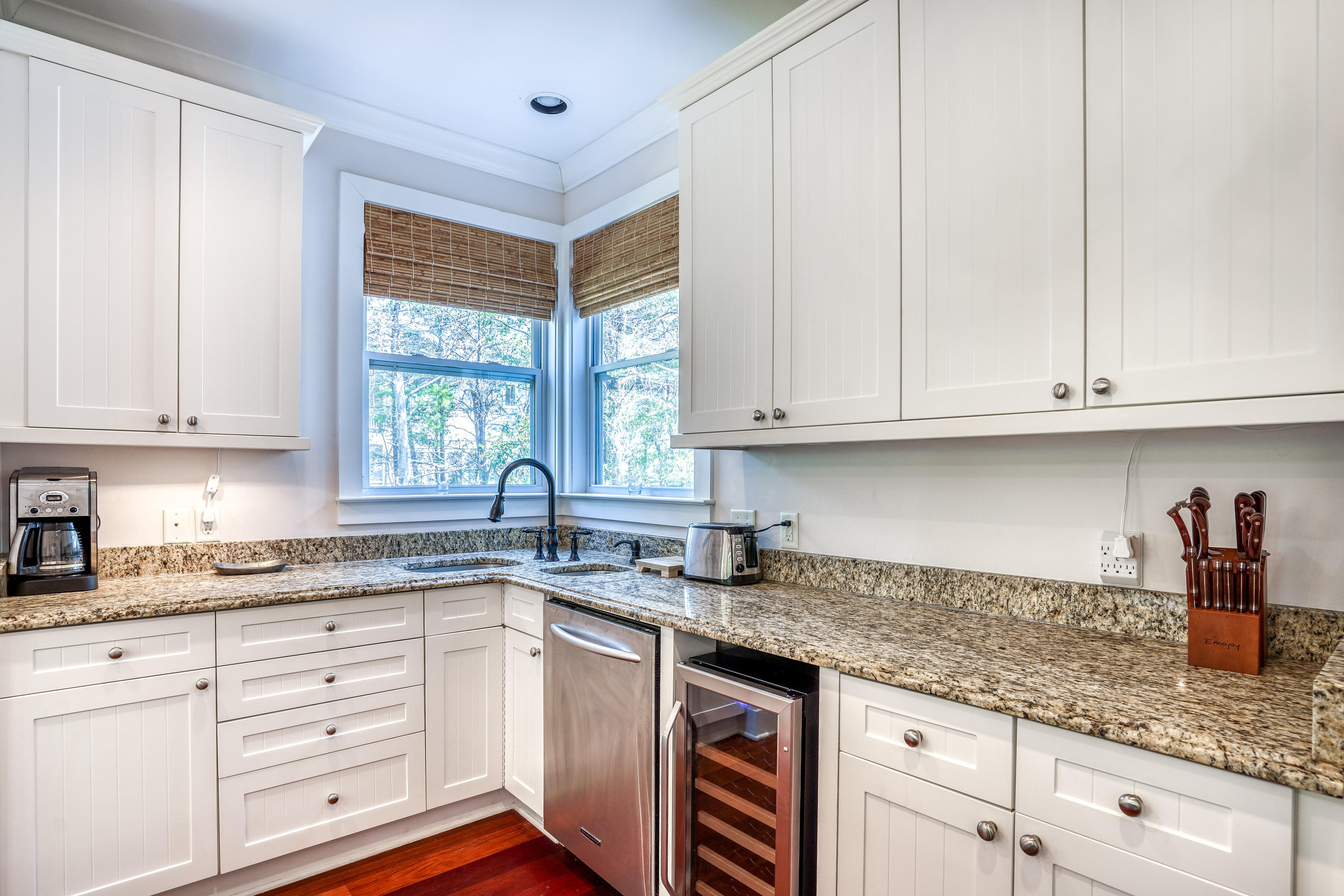 43 Lifeguard Loop East Inlet Beach, FL 32461 - Photo 10 of 44 a kitchen with granite countertop white cabinets stainless steel appliances a sink and window