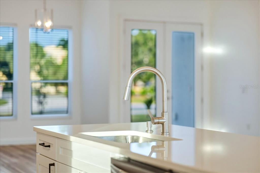 1215 Rio De Janeiro Avenue Punta Gorda, FL 33983 - Photo 30 of 65 a bathroom with a sink and a mirror