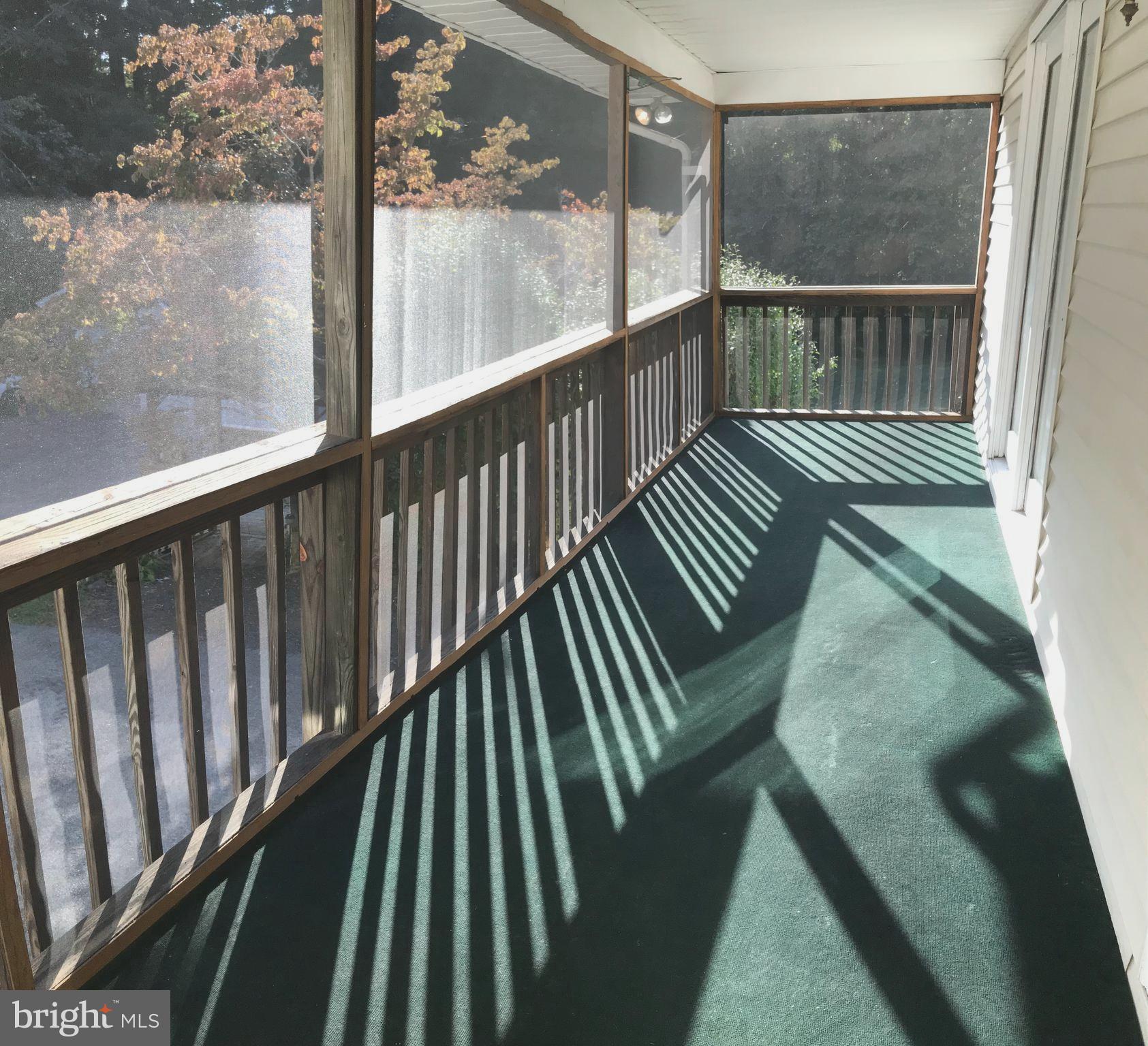 420 Clay Hammond Road Prince Frederick, MD 20678 - Photo 11 of 38 Screened in porch off kitchen for eating crabs!