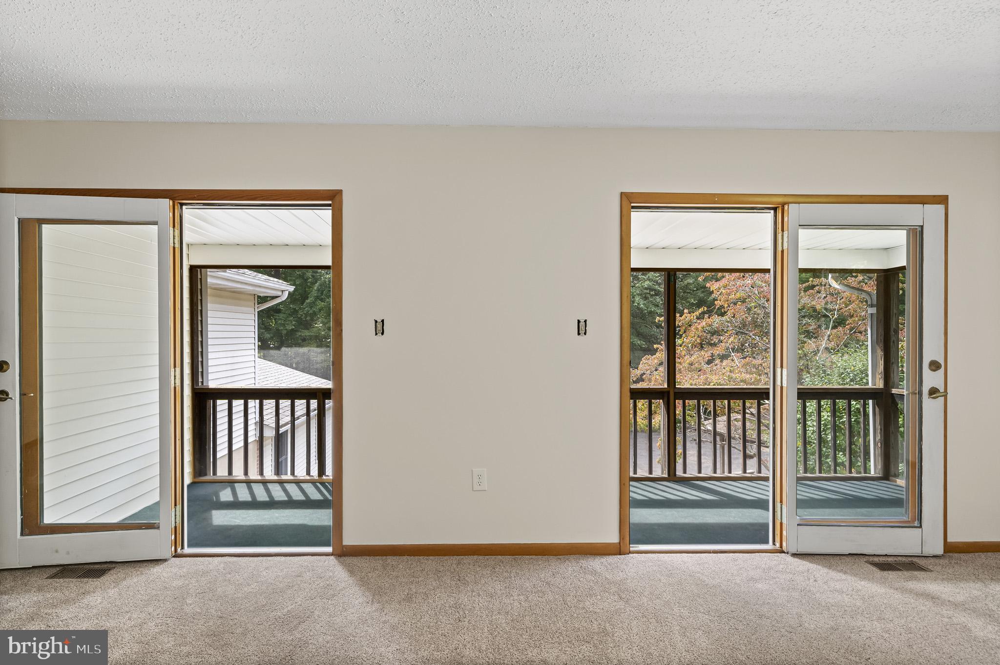 420 Clay Hammond Road Prince Frederick, MD 20678 - Photo 10 of 38 Huge great room with 2 doors to the screened porch