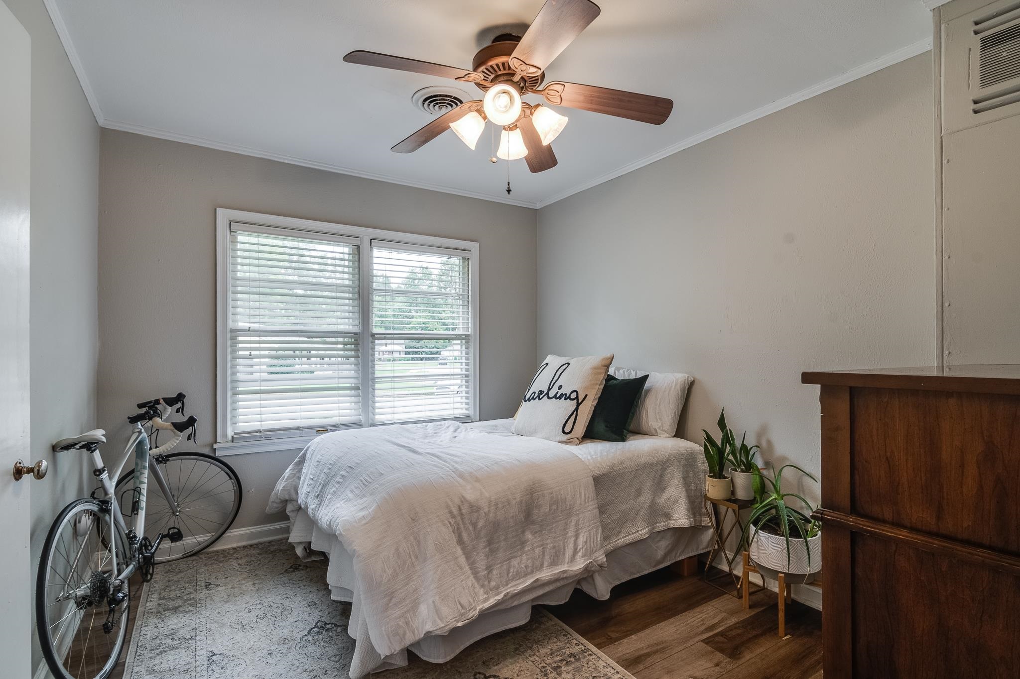 3901 Lytle Circle Memphis, TN 38122 - Photo 12 of 36 a bedroom with a bed and a chandelier