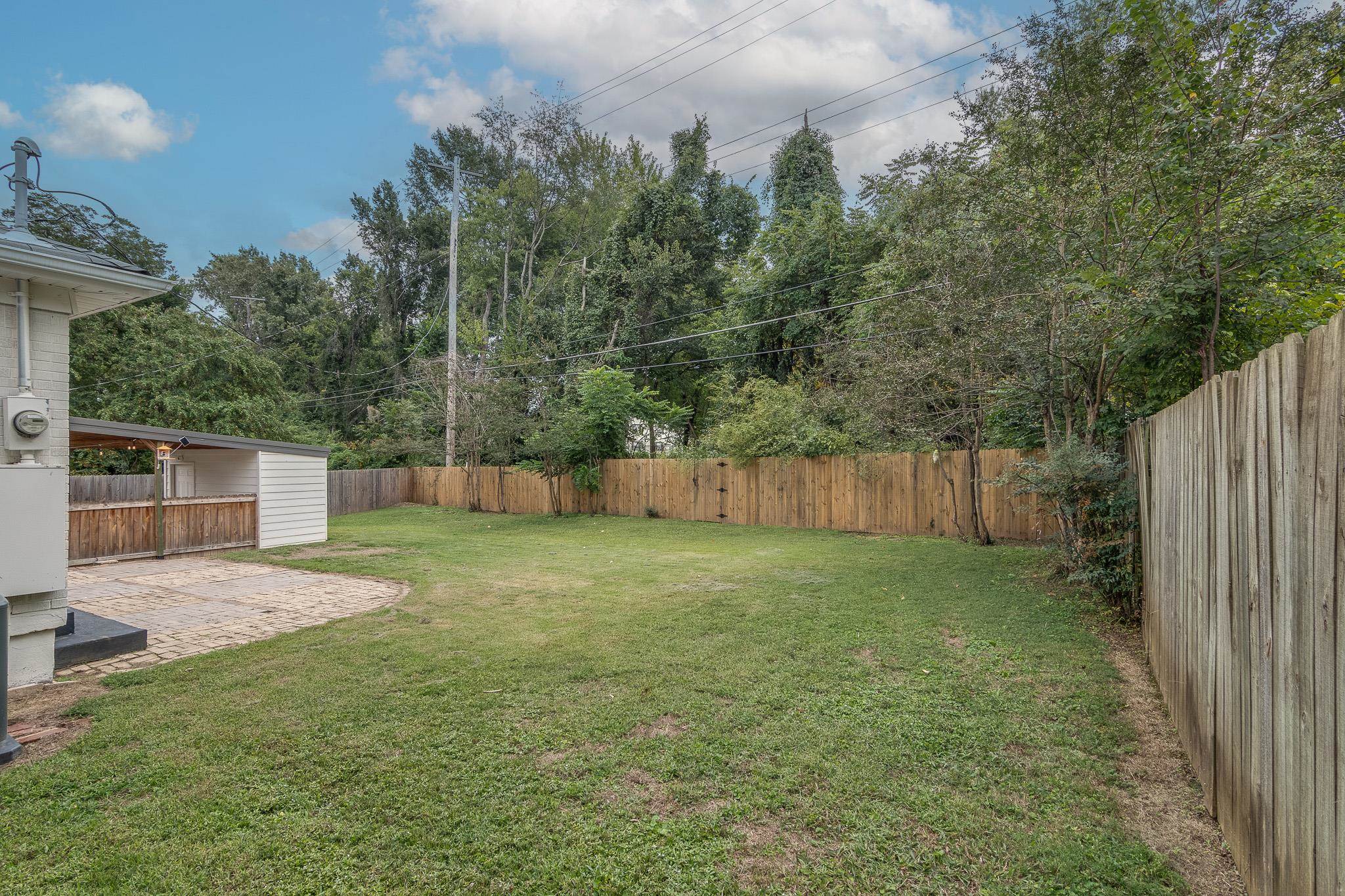 3901 Lytle Circle Memphis, TN 38122 - Photo 35 of 36 a backyard of a house with lots of green space