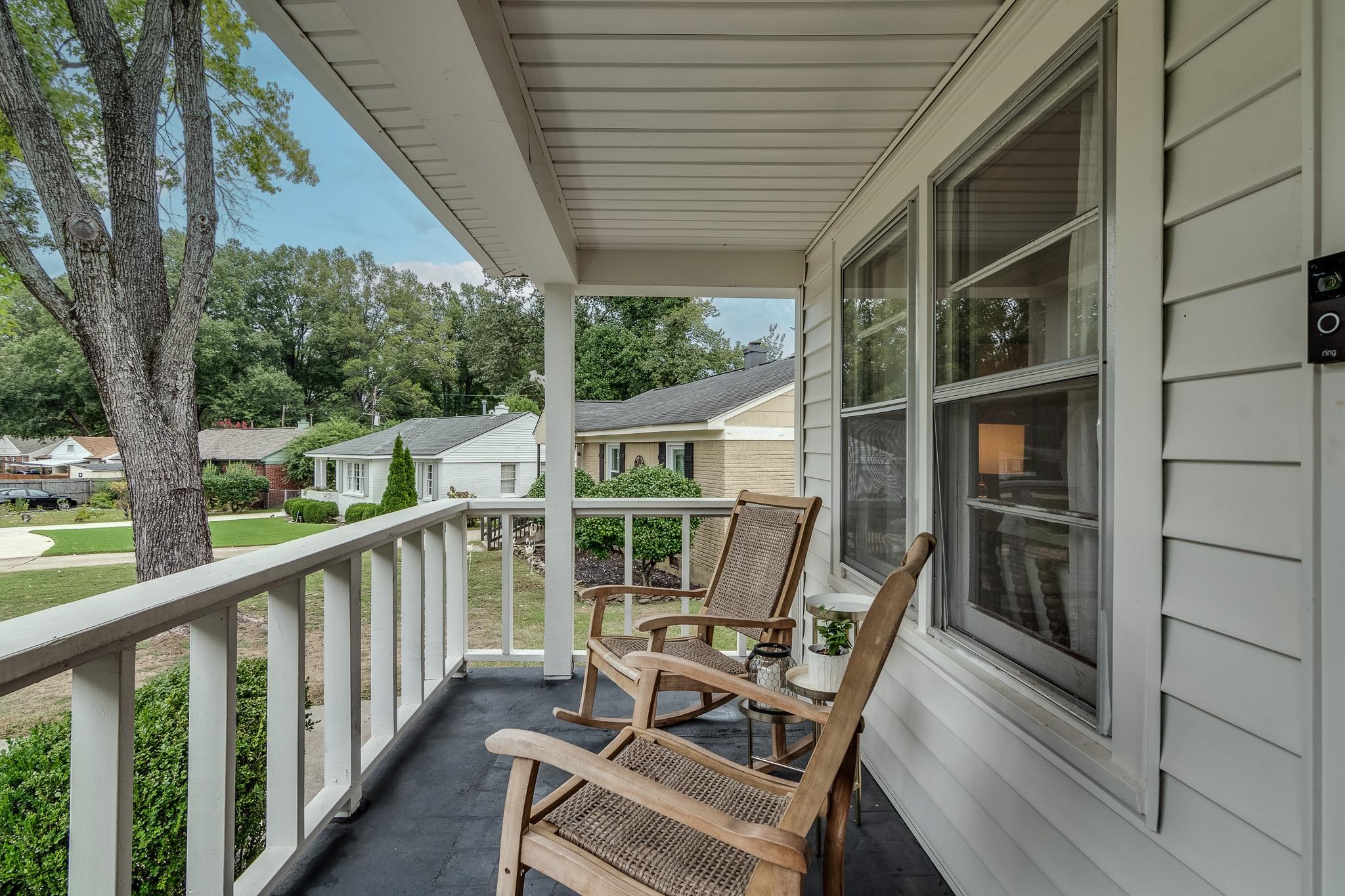 3901 Lytle Circle Memphis, TN 38122 - Photo 4 of 36 a view of roof deck with chairs and wooden fence