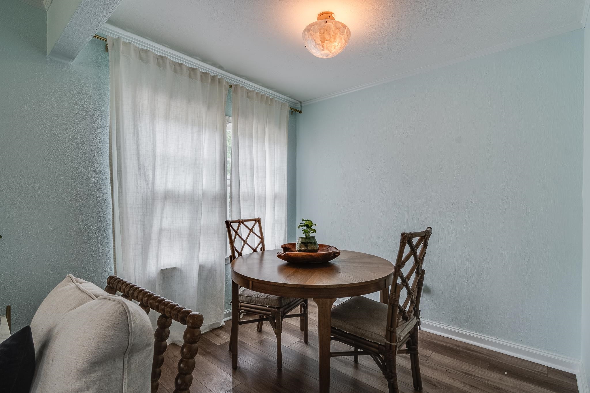 3901 Lytle Circle Memphis, TN 38122 - Photo 10 of 36 a view of a dining room with furniture and wooden floor