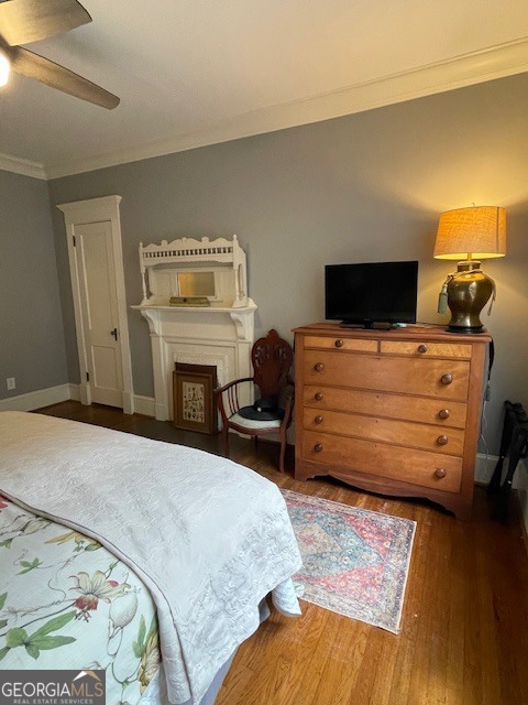 311 3rd Street Manchester, GA 31816 - Photo 31 of 62 a bedroom with a bed and a tv