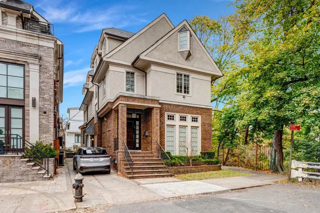 a view of a dining room with furniture and window