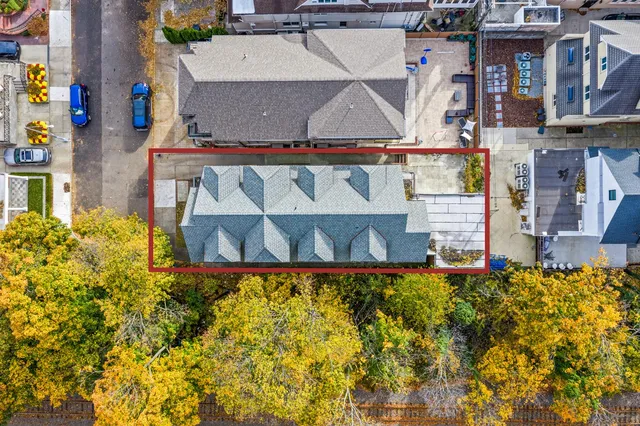 a view of a livingroom with furniture and a large window