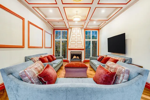 a view of entryway dining room and hall with wooden floor