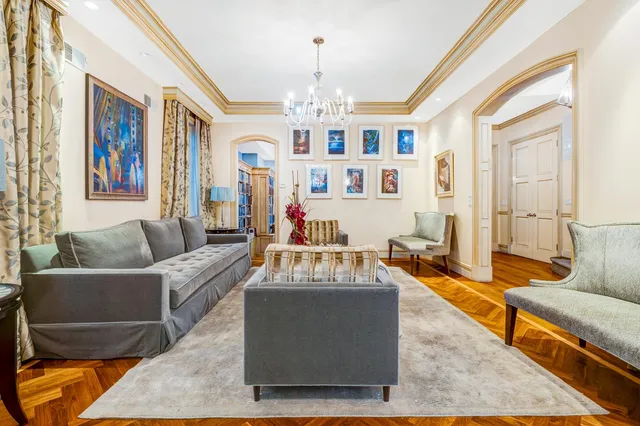 a kitchen with a sink a stove and a refrigerator