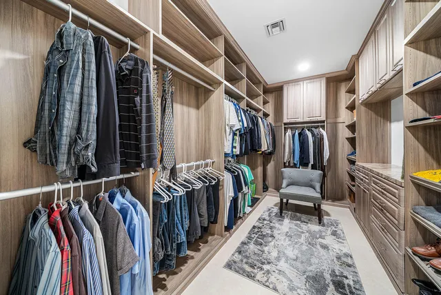 a living room with furniture fireplace and flat screen tv