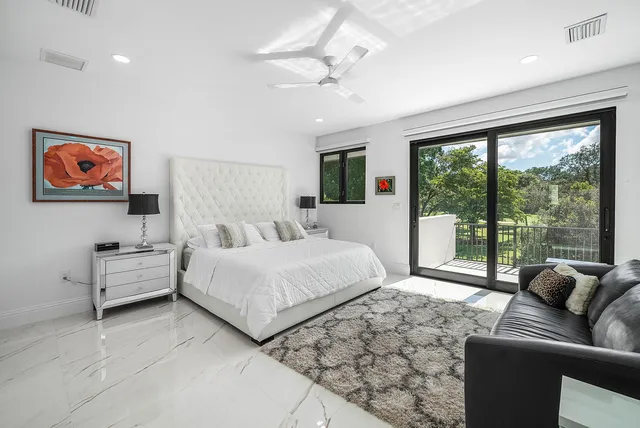 a view of a house with a yard porch and sitting area