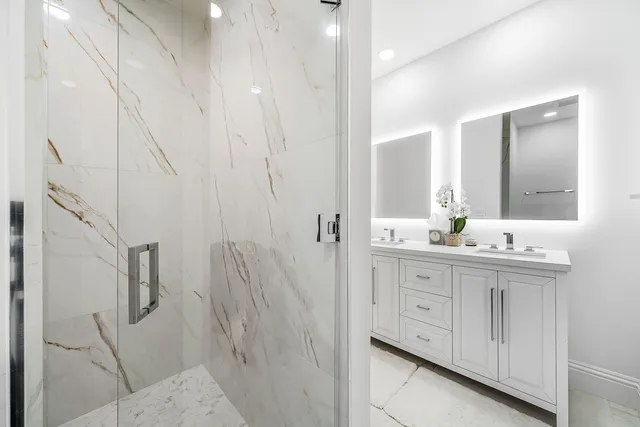 a view of a swimming pool with a yard