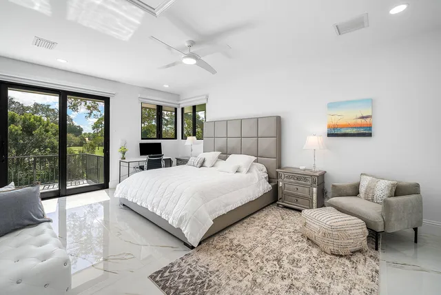 a view of a golf course with a lake