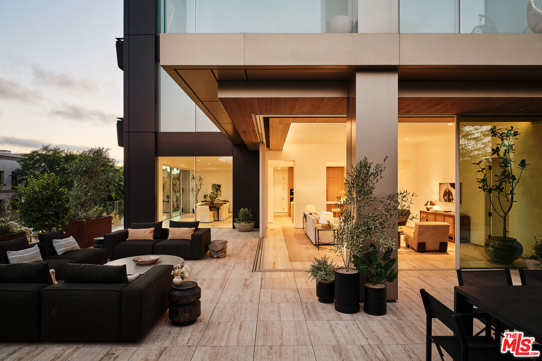 8899 Beverly Boulevard, Unit 4D Los Angeles, CA 90048 - Photo 1 of 28 a living room with furniture and a large window