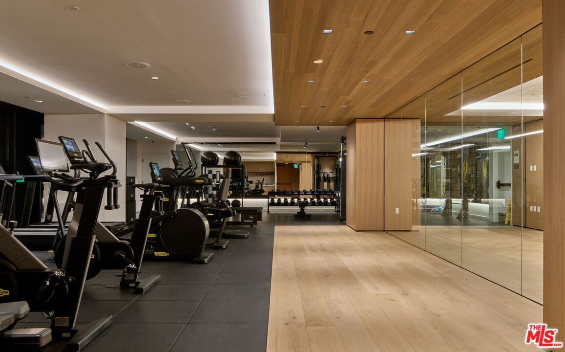 8899 Beverly Boulevard, Unit 4D Los Angeles, CA 90048 - Photo 23 of 28 a view of a room with gym equipment