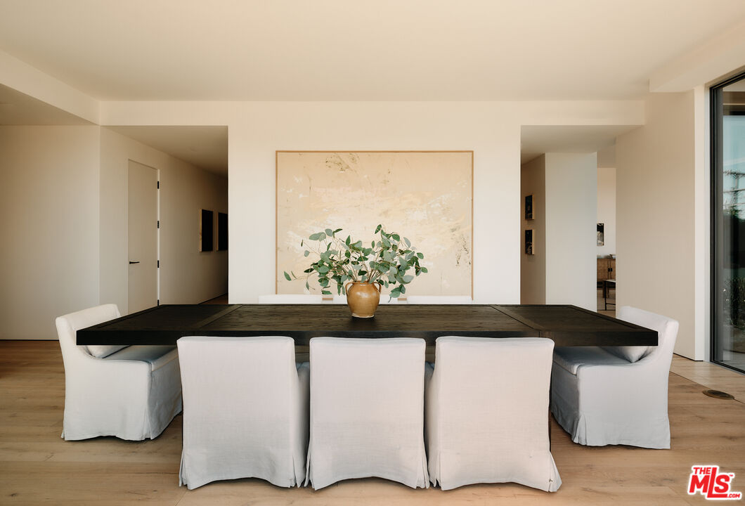 8899 Beverly Boulevard, Unit 4D Los Angeles, CA 90048 - Photo 10 of 28 a close view of kitchen island with a sink and wooden floor