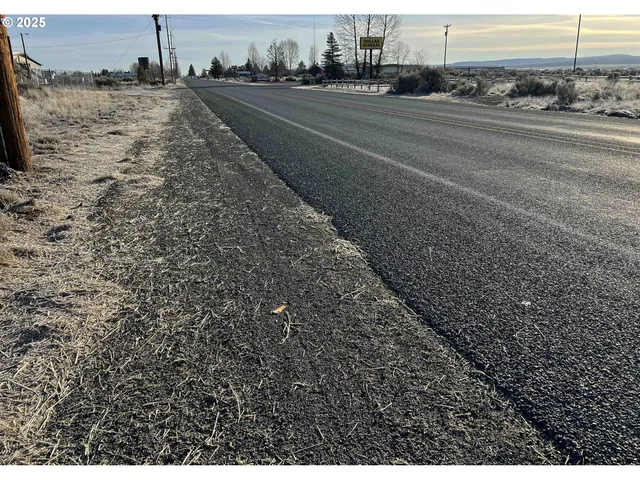 a view of a backyard of a house
