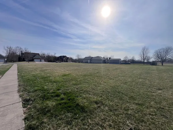 a view of a lake from a yard