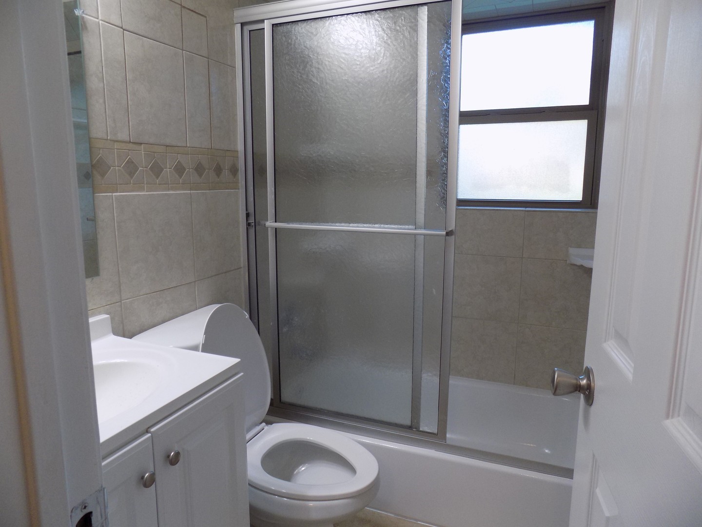 12705 Pebble Creek Lane Cypress, TX 77429 - Photo 12 of 19 a bathroom with a granite countertop sink toilet and shower