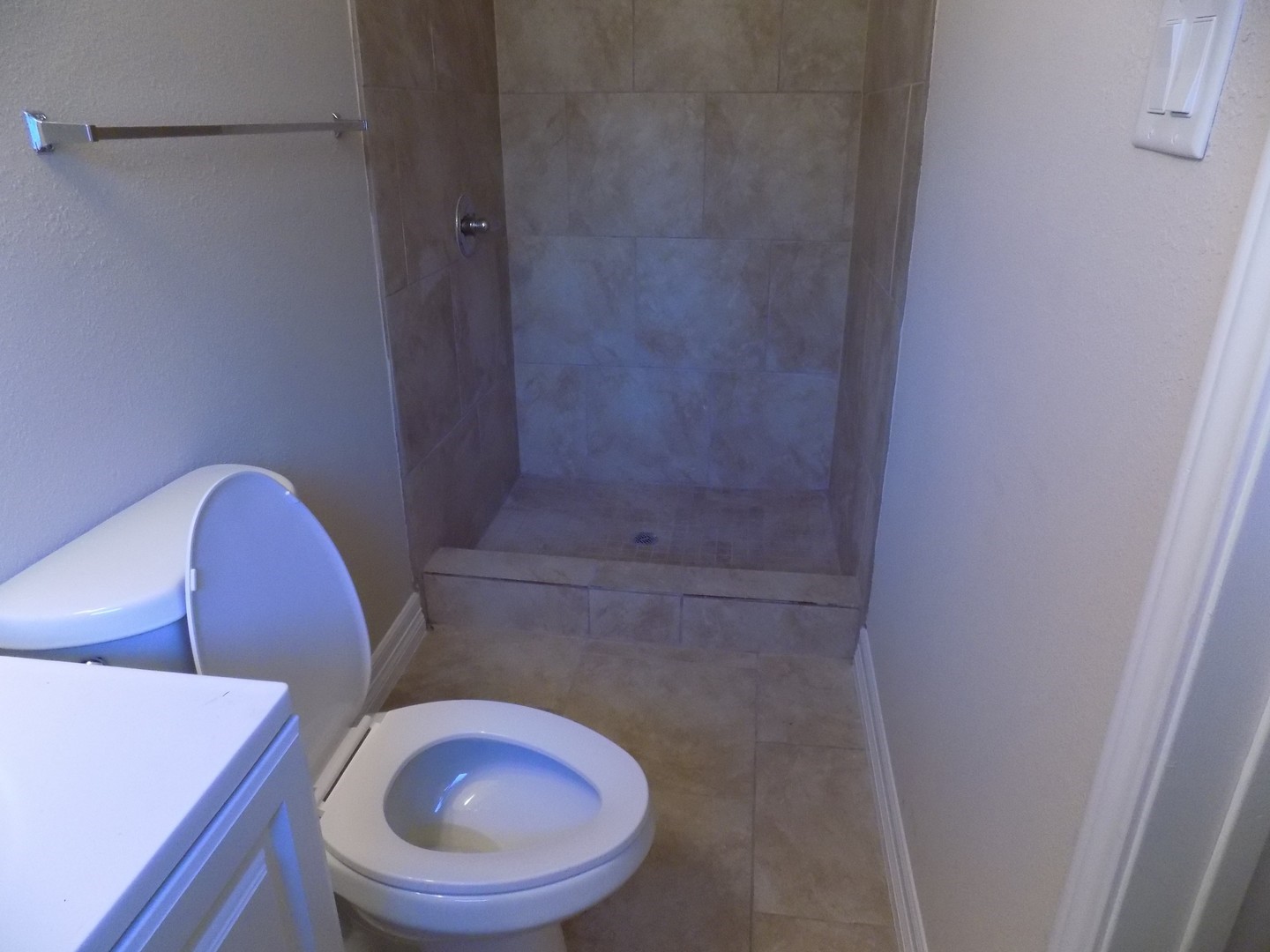 12705 Pebble Creek Lane Cypress, TX 77429 - Photo 13 of 19 a bathroom with a toilet and a sink