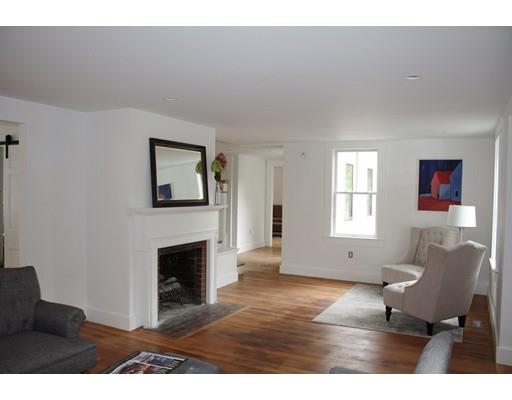 5 Rutledge Road Belmont, MA 02478 - Photo 8 of 22 a living room with furniture and a fireplace