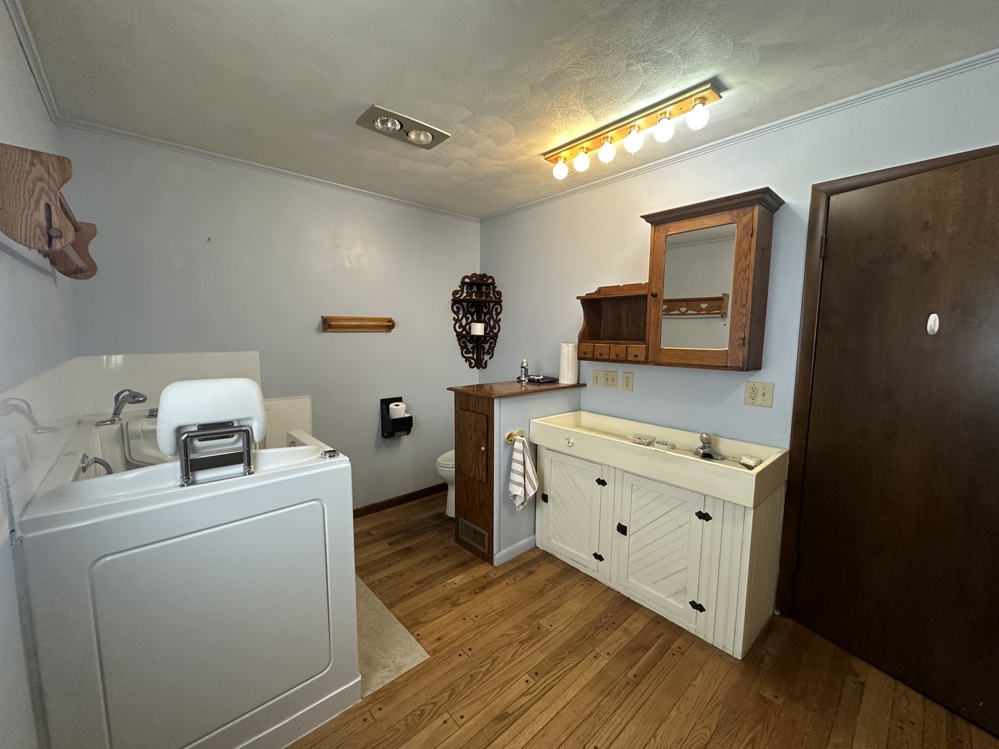 10015 Stichter Street Fenton, IL 61251 - Photo 19 of 35 a room with a bed and a dresser