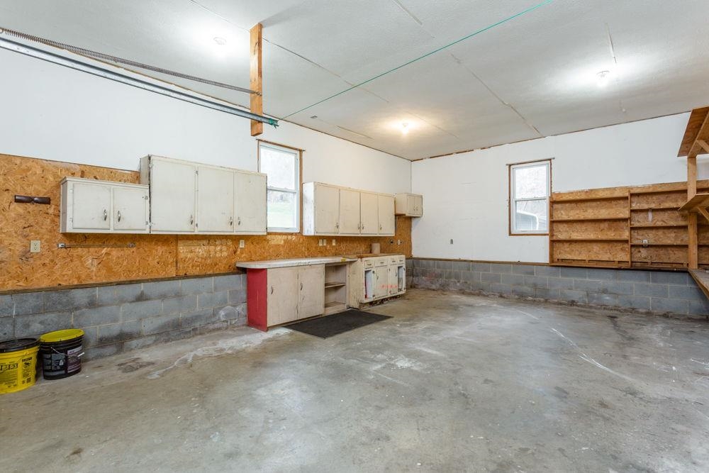 10807 Indian Trail Road Harrisonburg, VA 22802 - Photo 16 of 32 a kitchen with stainless steel appliances granite countertop a sink and cabinets