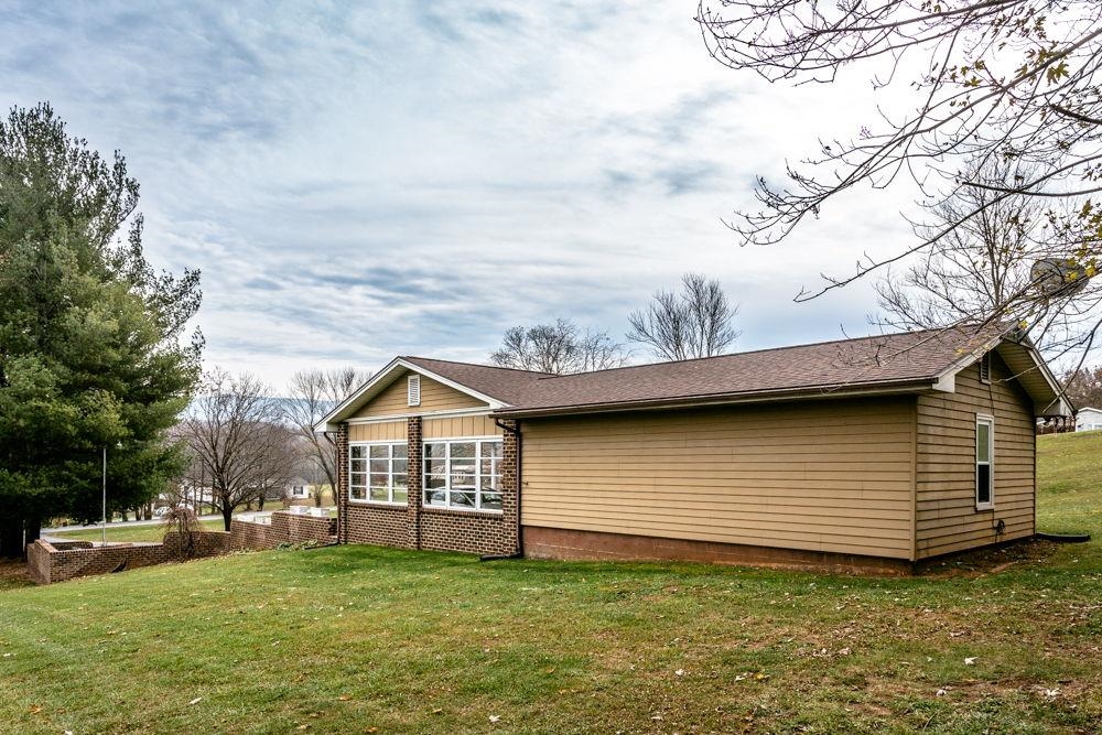 10807 Indian Trail Road Harrisonburg, VA 22802 - Photo 24 of 32 a view of a backyard with a garden