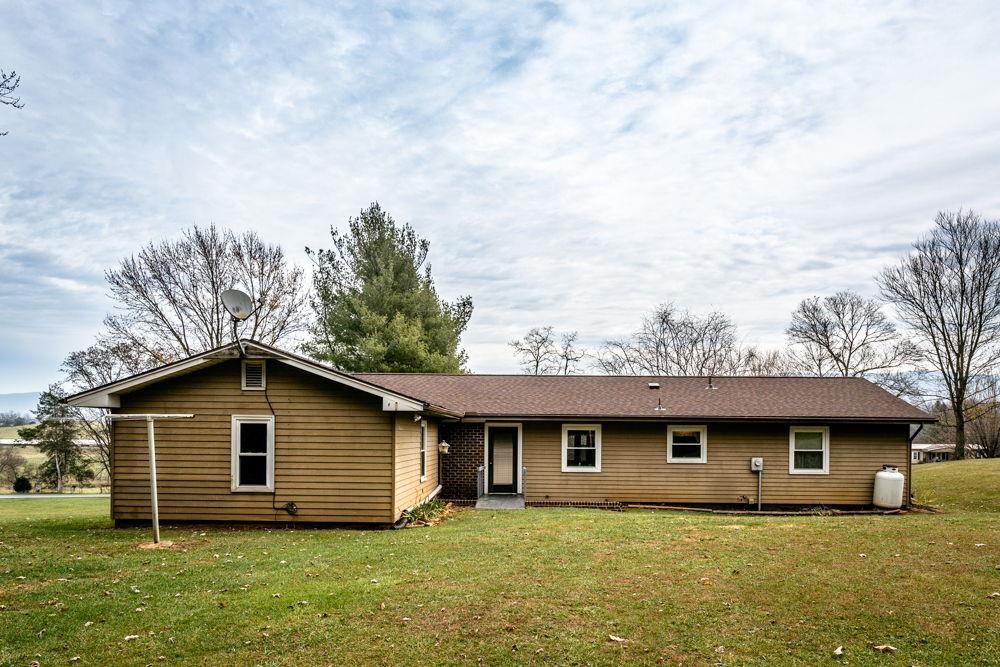 10807 Indian Trail Road Harrisonburg, VA 22802 - Photo 25 of 32 front view of a house with a yard