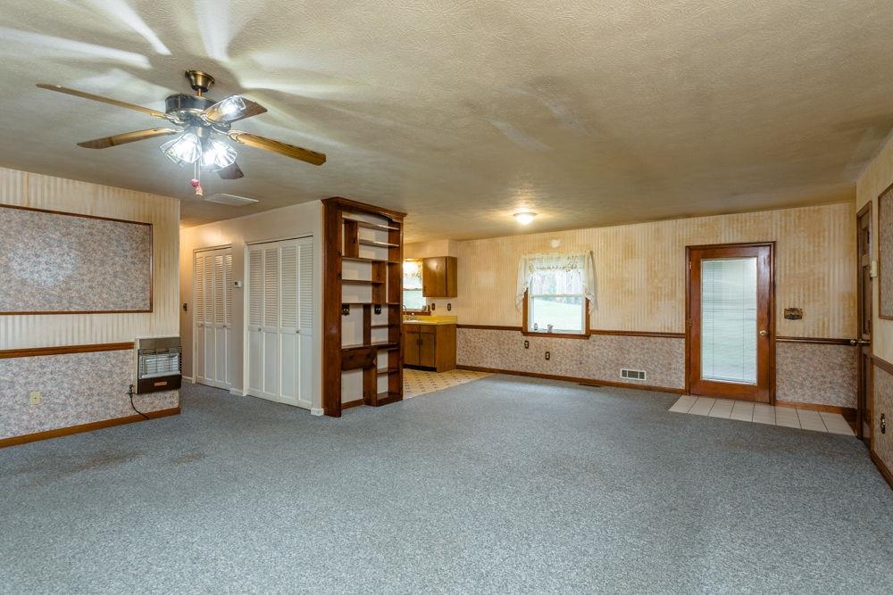 10807 Indian Trail Road Harrisonburg, VA 22802 - Photo 10 of 32 a view of an empty room with closet and a ceiling fan