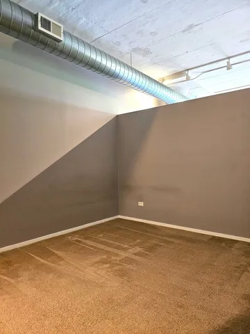 a view of a room with racks on the wall