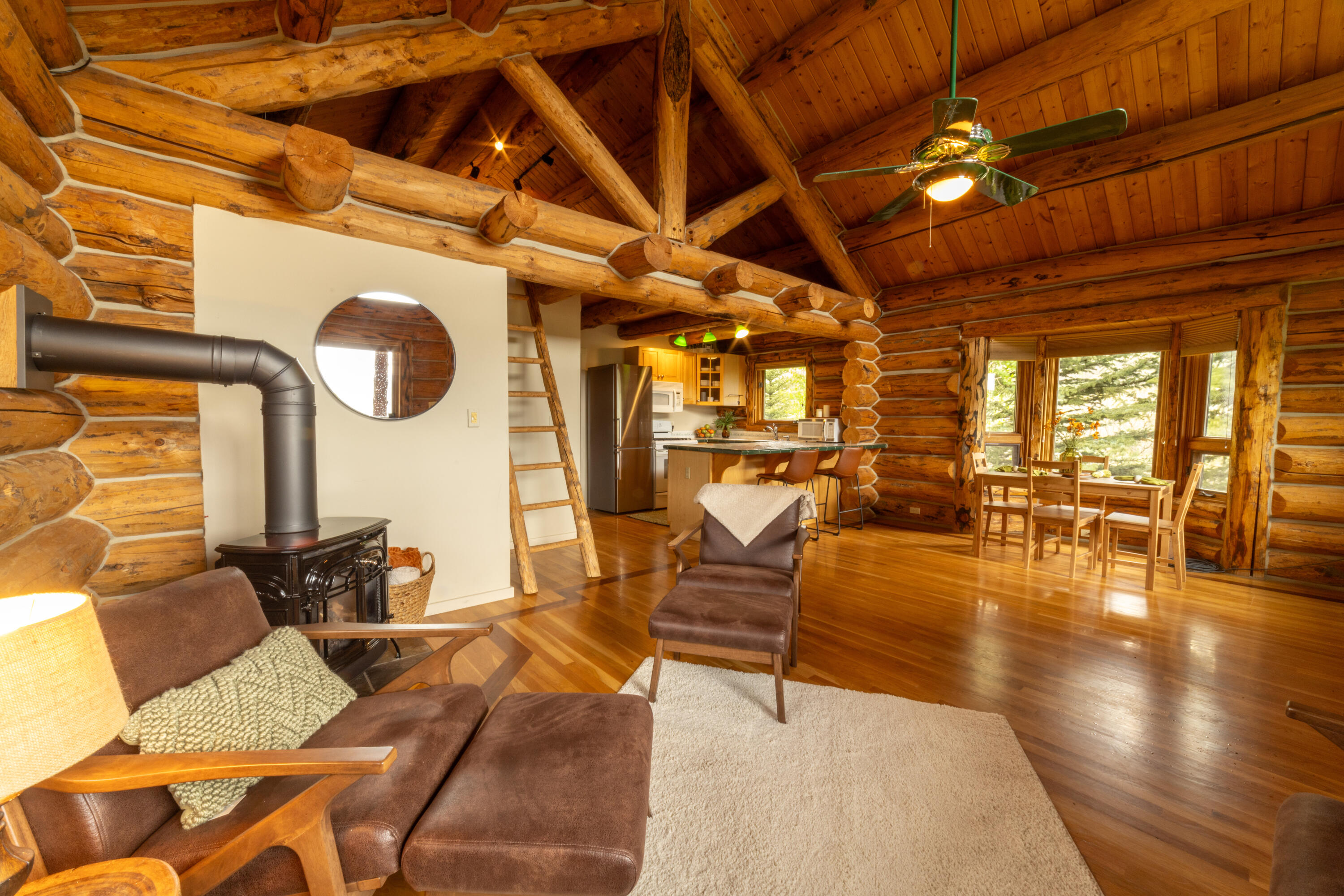 2001 County Road Placerville, CO 81430 - Photo 11 of 37 a living room with patio furniture and wooden floor